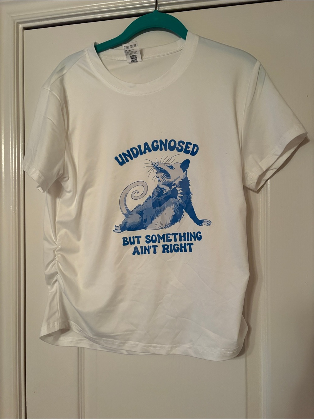 Women’s Fitted White Graphic Tee with Blue Opossum Illustration